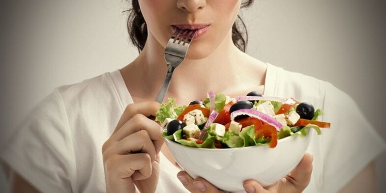 The girl eats well to avoid overweight problems